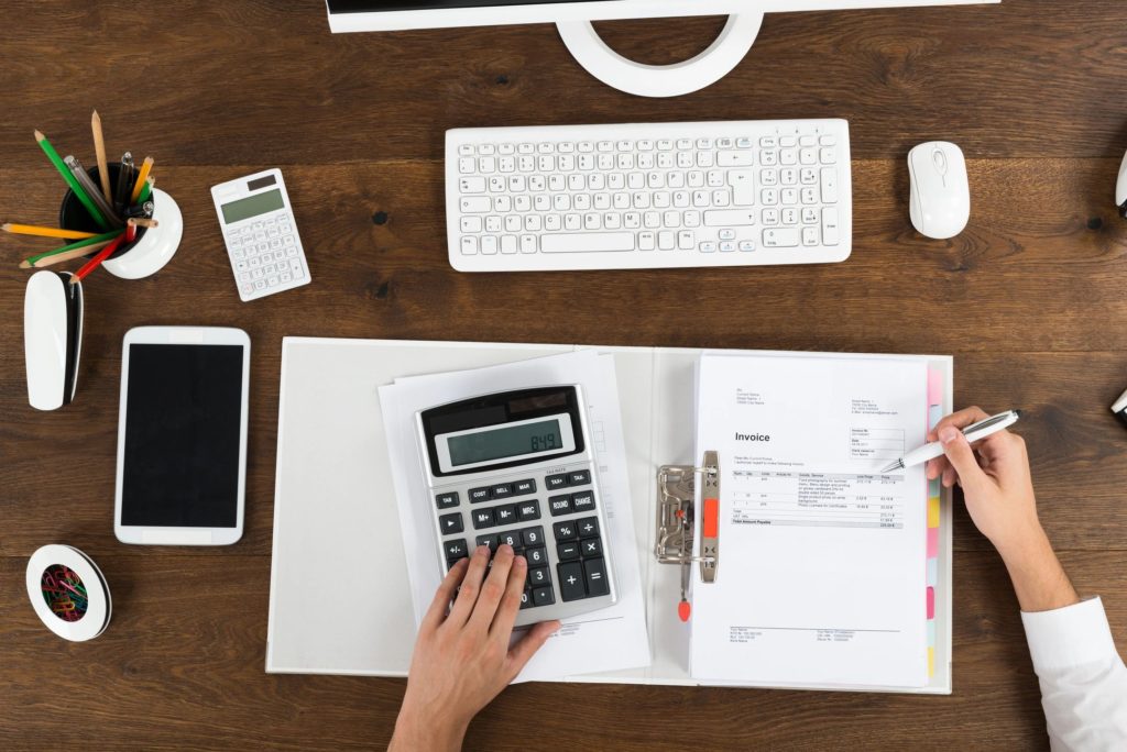 calculator, taxes, ledger